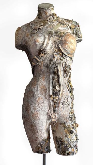 Fertility, found items, fabric, hardware, gesso, modelling paste on recycled body form, 57"x16"x9" by Natalie Oliphant
